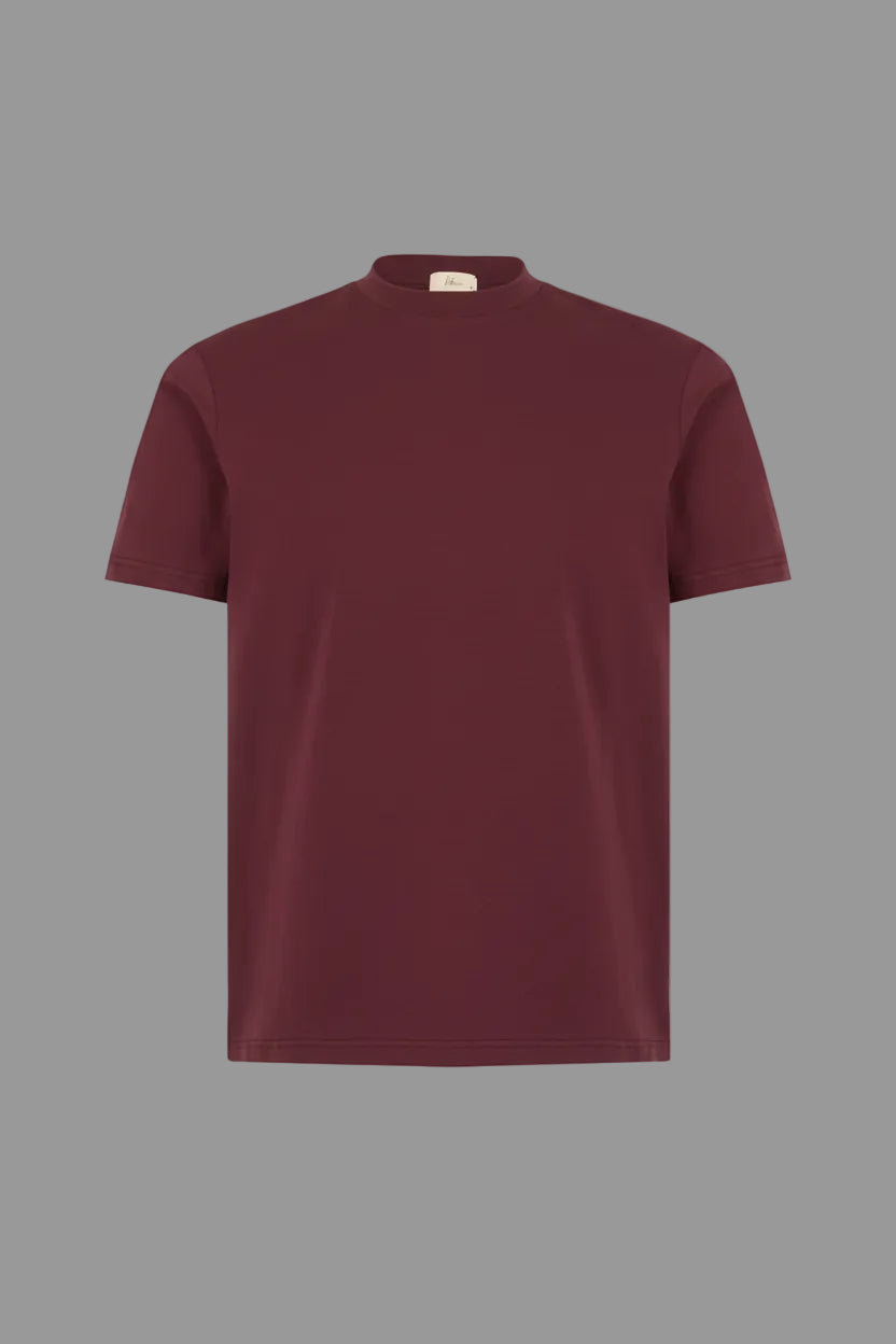 Maroon t-shirt on a light gray background